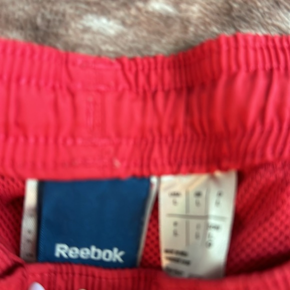 Red Reebok athletic shorts - Picture 2 of 2